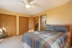 Master bedroom with a queen bed